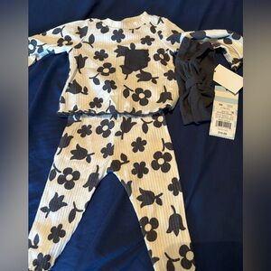 Brand new newborn outfit with headband and with tags